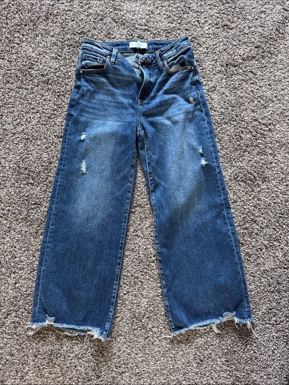 Risen jeans,  worn 1 time.   Size 7/28